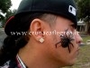 CURIOSITA’ DAL MONDO/ Per superare la paura dei ragni se ne fa tatuare uno in faccia