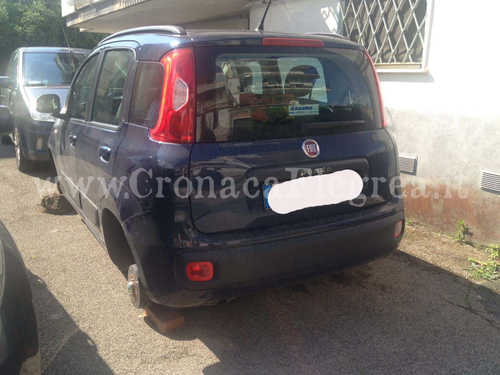 POZZUOLI/ Ladri di ruote scatenati: Fiat Panda lasciata sui mattoni